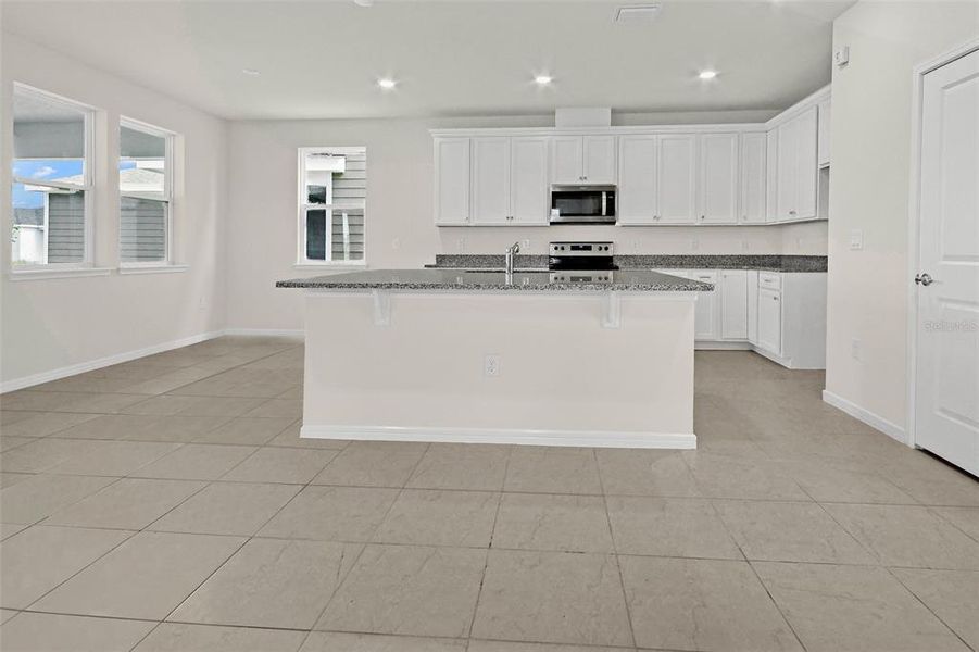 Furnished interior view inside a new home in Weslyn Park, St. Cloud (Image 13).