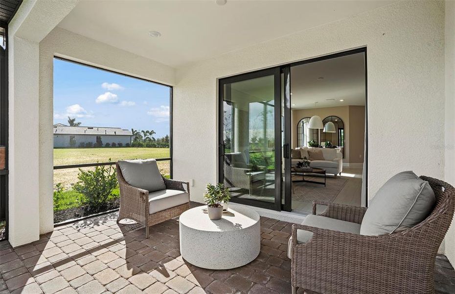 Exterior details and patio area of a home in Talon Preserve on Palmer Ranch, Nokomis (Image 21).