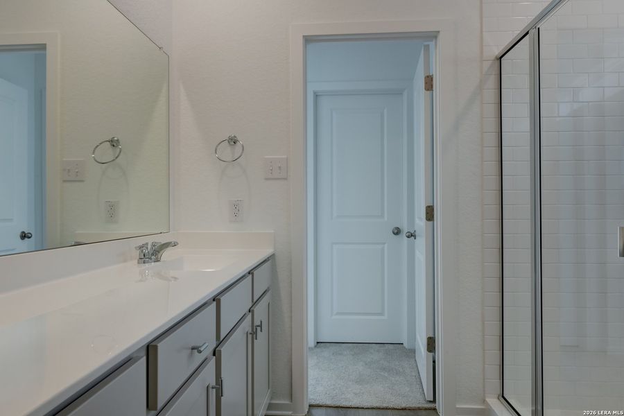 Furnished interior view inside a new home in Hennersby Hollow, San Antonio (Image 6).