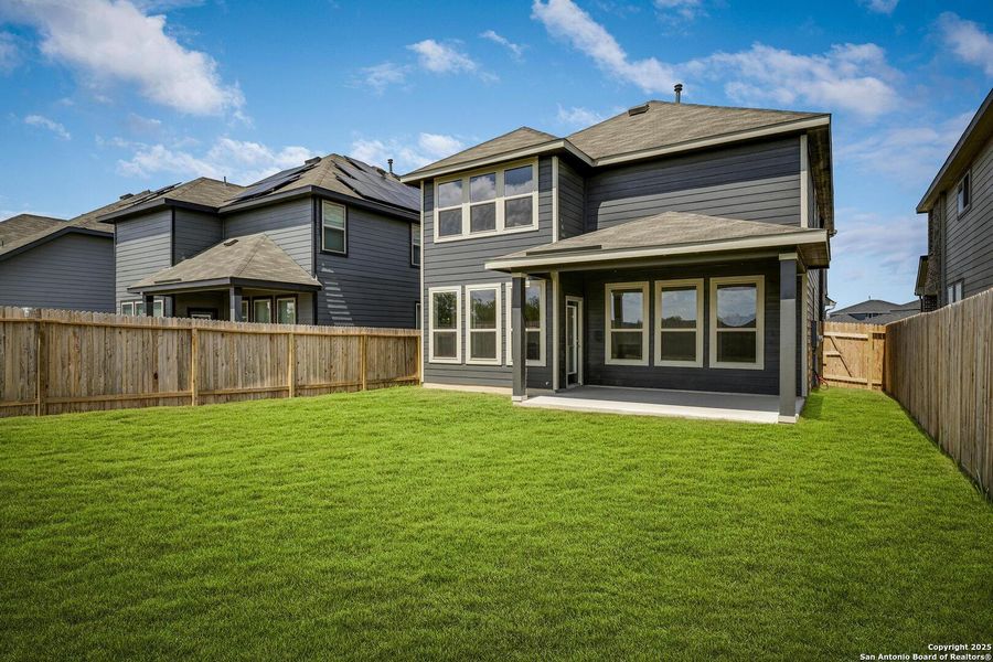 Front exterior of a new home in Morgan Meadows, San Antonio, TX, highlighting curb appeal (Image 18). Front exterior of a new home in Morgan Meadows, San Antonio, TX, highlighting curb appeal (Image 18).