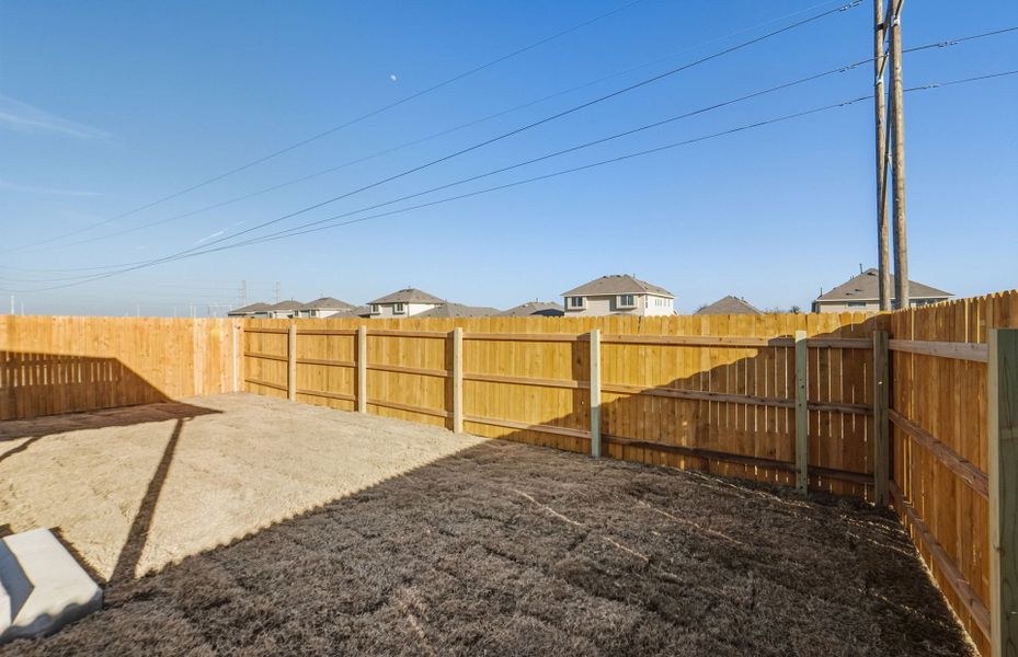 Exterior details and patio area of a home in Crosswinds, Kyle (Image 21).