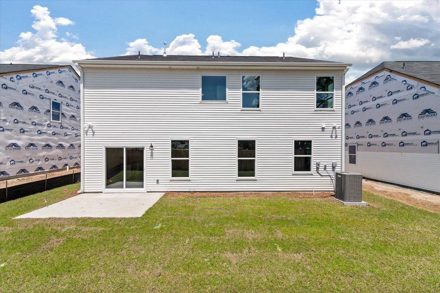 Exterior details and patio area of a home in Oakley Pointe, Moncks Corner (Image 25).