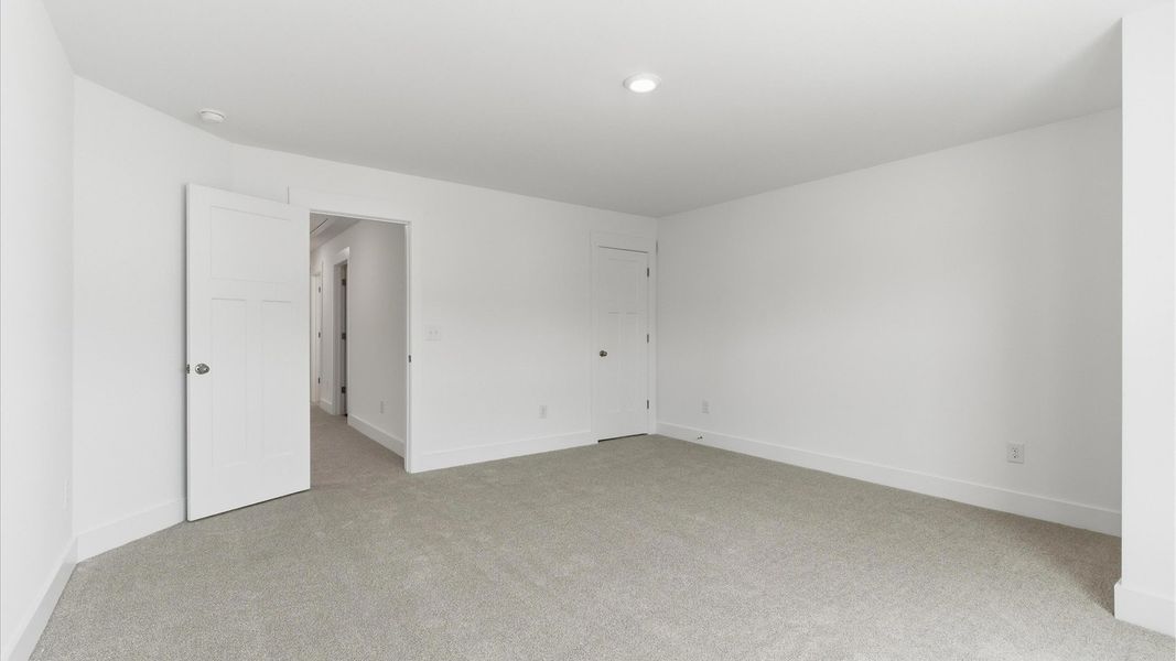 Furnished interior view inside a new home in Village at Midway, Anderson (Image 26).