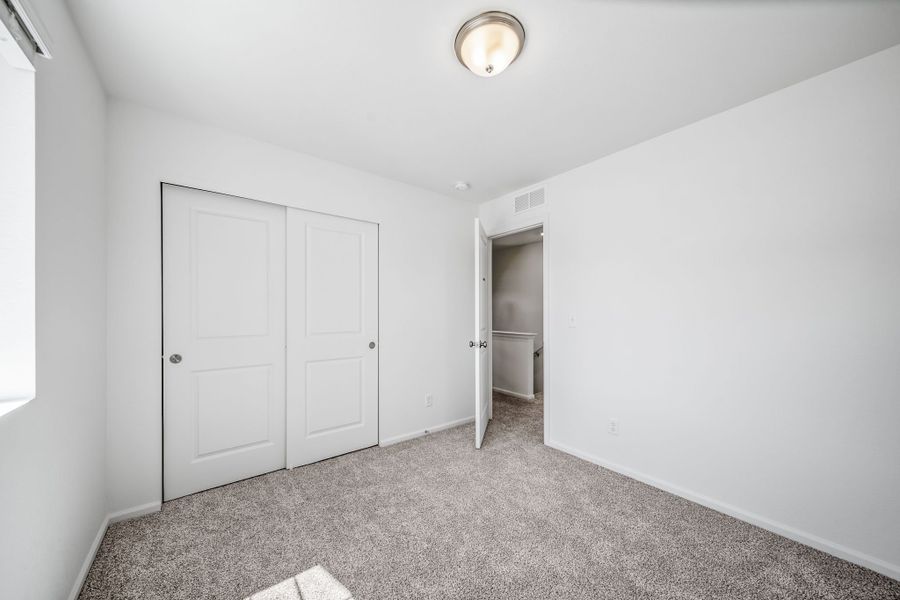Spacious, unfurnished interior of a new home in Muegge Farms, Bennett (Image 14).