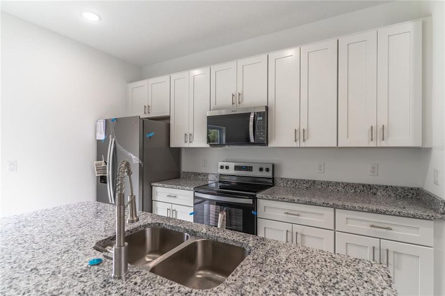 Furnished interior view inside a new home in , Ocala (Image 8).
