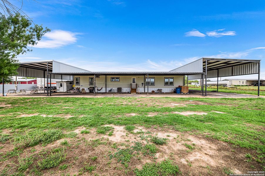 Front exterior of a new home in , Pearsall, TX, highlighting curb appeal (Image 2). Front exterior of a new home in , Pearsall, TX, highlighting curb appeal (Image 2).