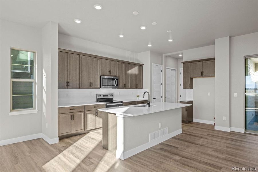 Furnished interior view inside a new home in Painted Prairie, Aurora (Image 11). Furnished interior view inside a new home in Painted Prairie, Aurora (Image 11).