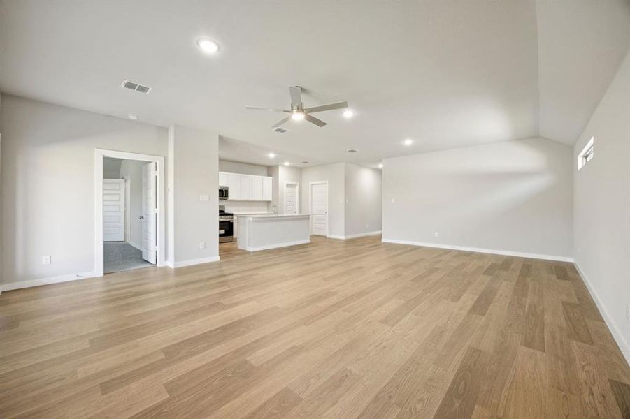 Open Floor Plan in the Oscar home plan by Trophy Signature Homes – REPRESENTATIVE PHOTO