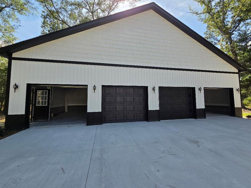 Front exterior of a new home in , Meggett, SC, highlighting curb appeal (Image 19). Front exterior of a new home in , Meggett, SC, highlighting curb appeal (Image 19).