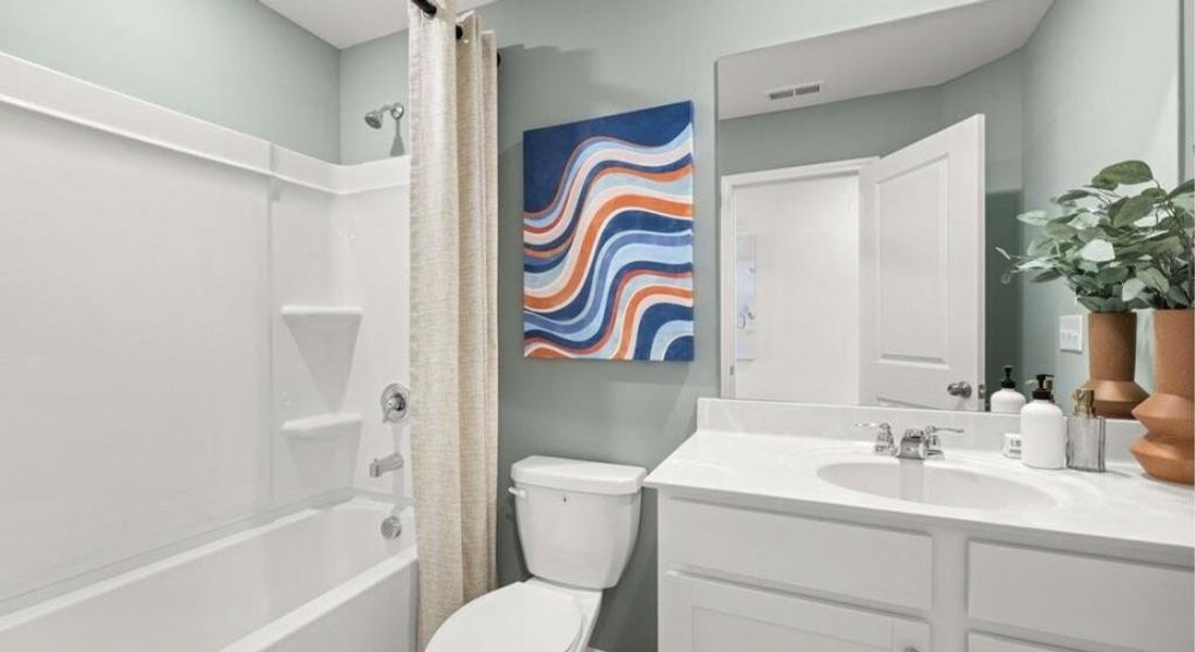 Furnished interior view inside a new home in Towns at Ivy Creek, Buford (Image 12).