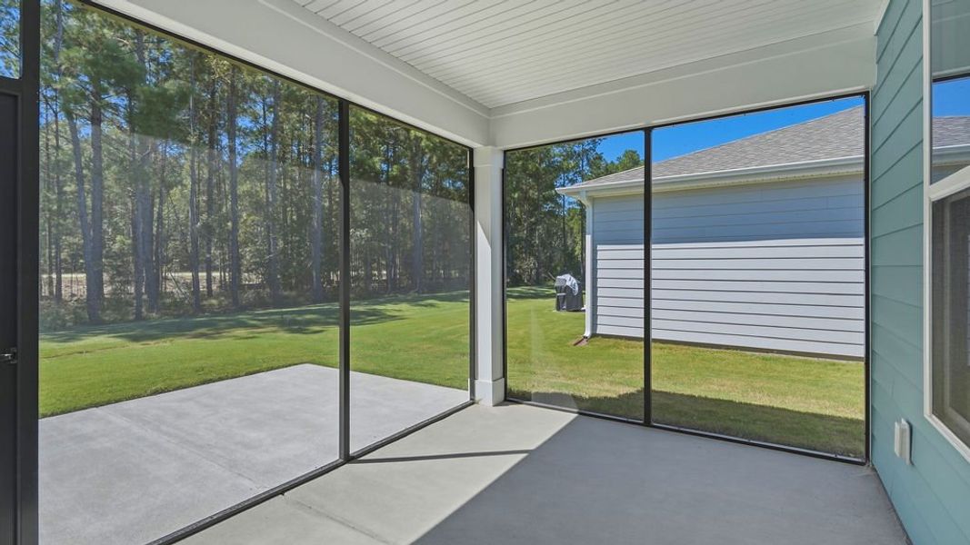 Exterior details and patio area of a home in Sun City Hilton Head, Bluffton (Image 22).