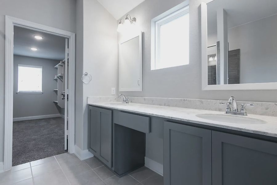 Representative furnished interior of a home built from the Finnigan by Chesmar Homes in Buffalo Crossing, Cibolo (Image 6).