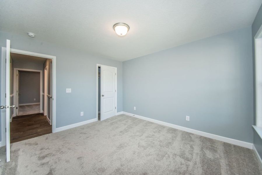 Representative unfurnished interior of a home built from the Jackson by Enchanted Homes in Lonesome Dove, San Antonio (Image 42).
