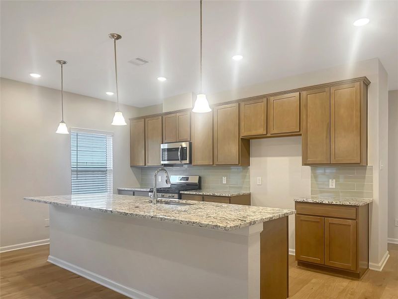 The Crawford- Kitchen. Home is under construction, photos used for illustration only; actual features, colors, and upgrades may vary. The Crawford- Kitchen. Home is under construction, photos used for illustration only; actual features, colors, and upgrades may vary.