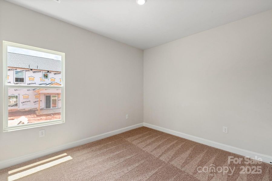 Spacious, unfurnished interior of a new home in Ascot Woods, Charlotte (Image 12).