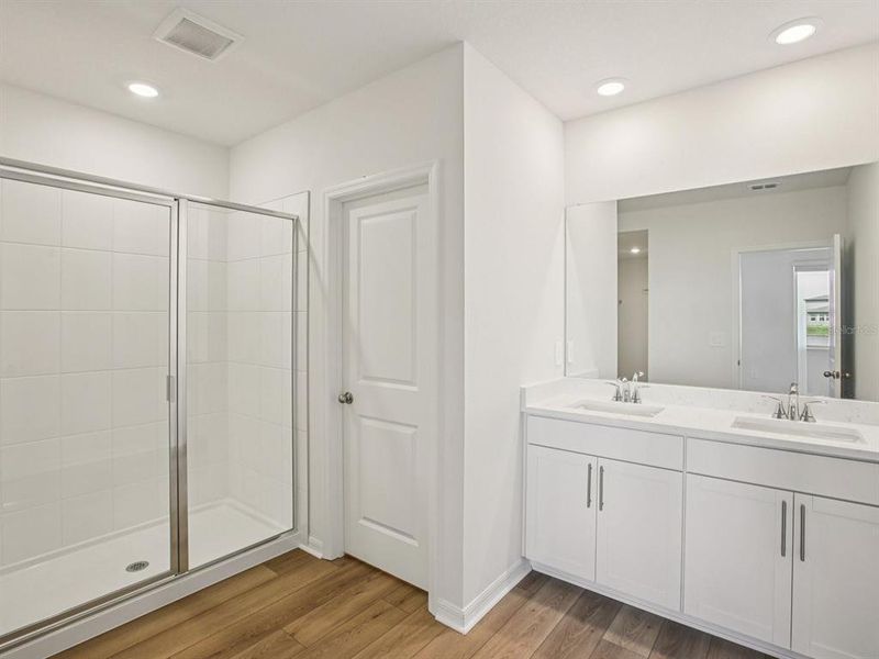 Furnished interior view inside a new home in The Grove at Stuart Crossing - Classic Series, Bartow (Image 12).