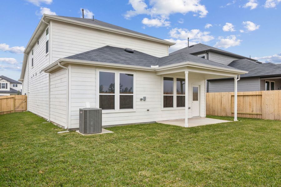 Exterior details and patio area of a home in Montgomery Bend, Montgomery (Image 4).