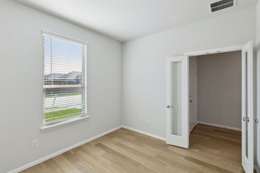 Study in the Holden home plan by Trophy Signature Homes – REPRESENTATIVE PHOTO