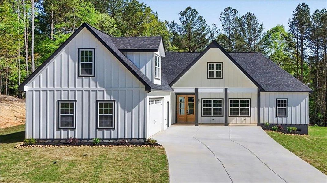 Front exterior of a new home in , Lindale, GA, highlighting curb appeal (Image 24).
