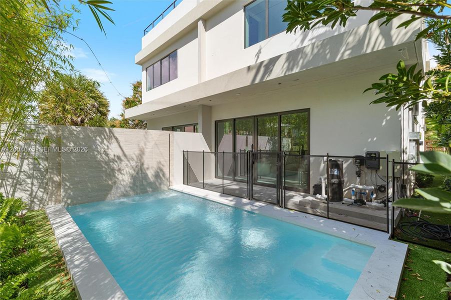 Exterior details and patio area of a home in , Miami (Image 3).