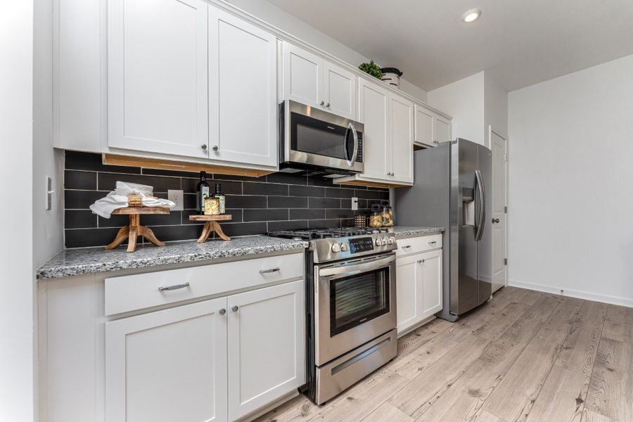 SAMPLE pics of a model home. Colors/features vary per listing.