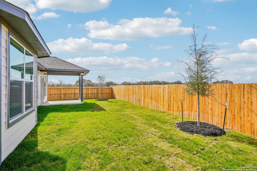 Exterior details and patio area of a home in Carmel Ranch, Schertz (Image 26).