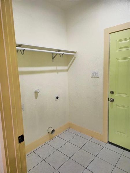 Empty room featuring dark wood-type flooring