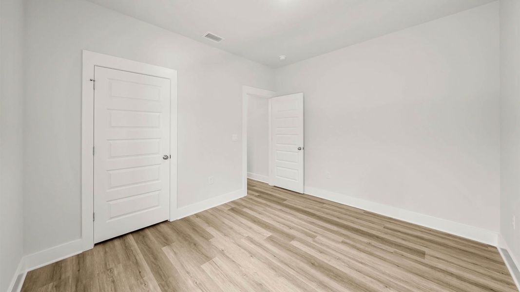 Spacious, unfurnished interior of a new home in WindMark Beach, Port Saint Joe (Image 14).
