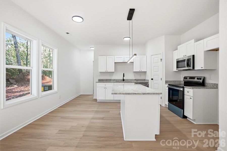 Furnished interior view inside a new home in , Wadesboro (Image 4).