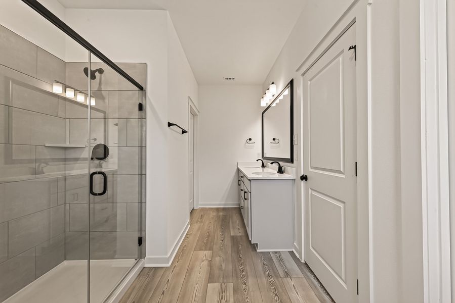 Furnished interior view inside a new home in Aldeana, Bonney (Image 17).