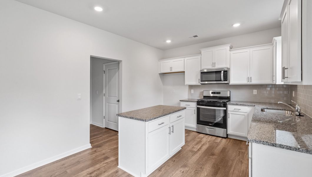 Representative furnished interior of a home built from the Biltmore by D.R. Horton in Brookside Farms, Greer (Image 7).