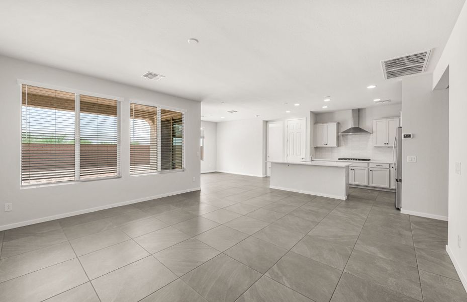 Spacious, unfurnished interior of a new home in Blossom Rock, Apache Junction (Image 14).