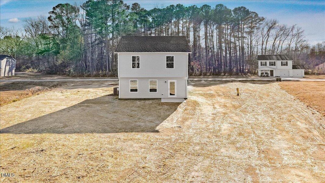 15-Aerial rear exterior view of home in