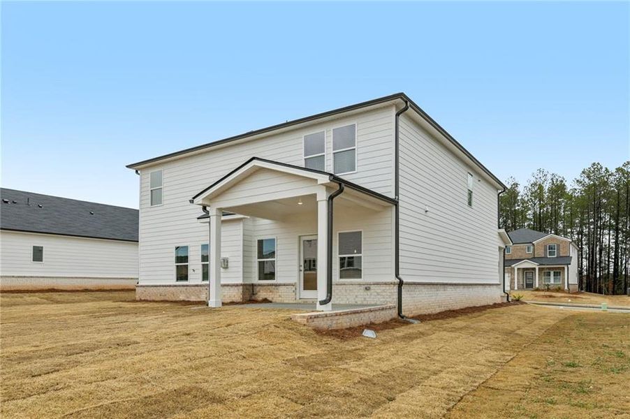 Exterior details and patio area of a home in Parkside at Grayson, Grayson (Image 3).