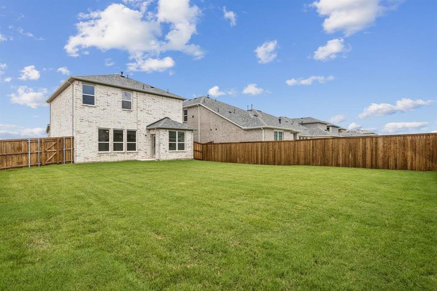 Front exterior of a new home in AnaCapri, Anna, TX, highlighting curb appeal (Image 15).