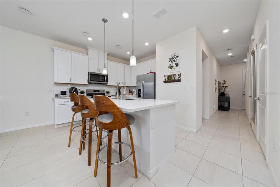 Furnished interior view inside a new home in , Kissimmee (Image 13).
