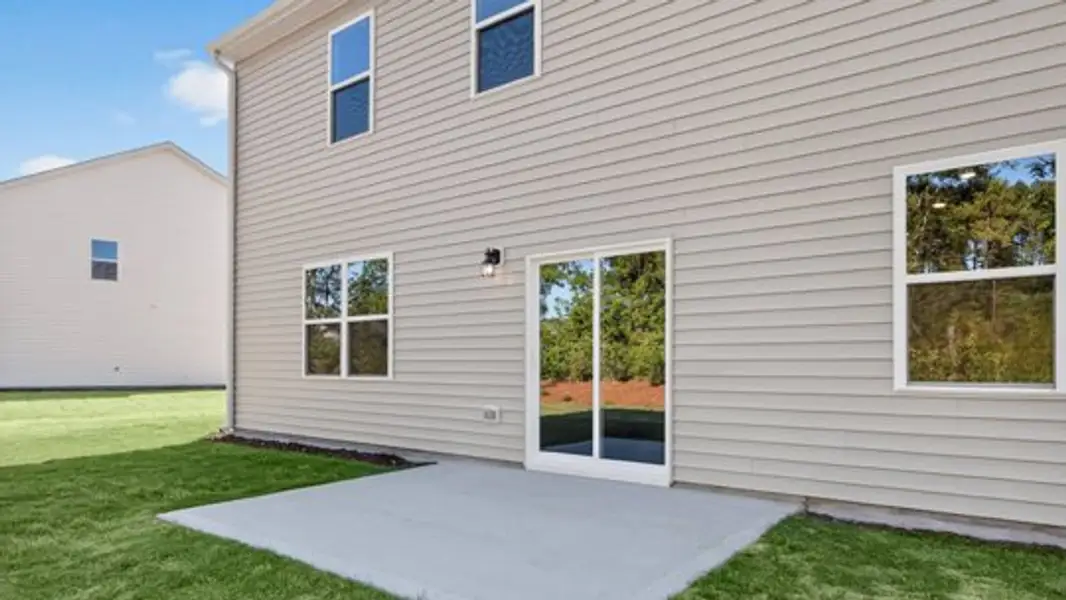 Exterior details and patio area of a home in The Reserve at Prestleigh, Wake Forest (Image 3).