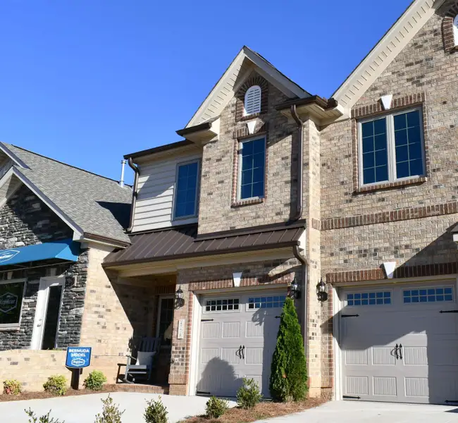 Front exterior of a new home in Trellises, High Point, NC, highlighting curb appeal (Image 1). Front exterior of a new home in Trellises, High Point, NC, highlighting curb appeal (Image 1).