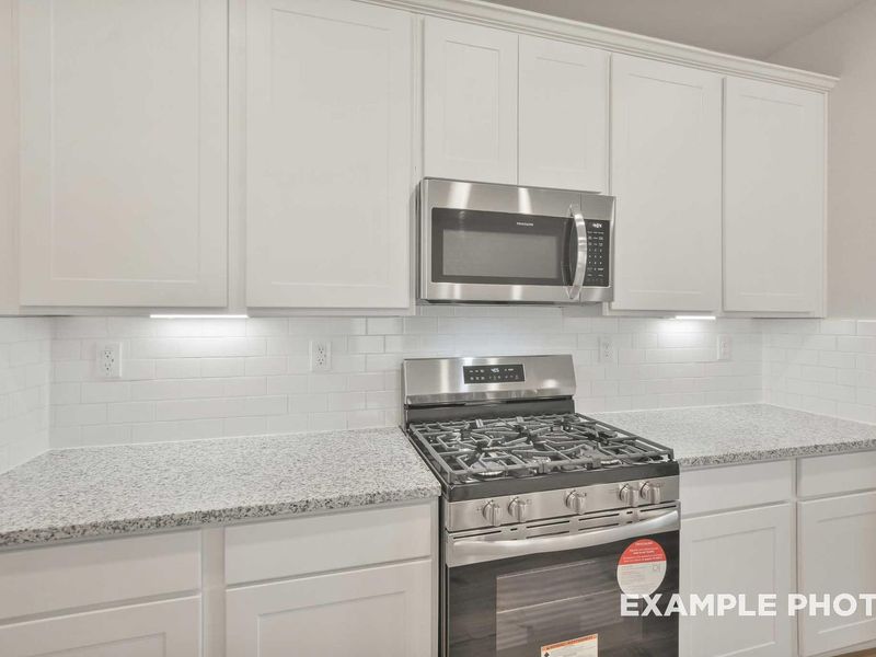Furnished interior view inside a new home in Caney Creek Place, Conroe (Image 6).