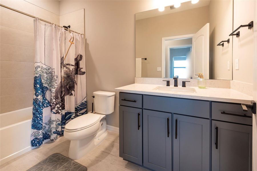 bathroom #2, shower with bath tub, quartz countertops