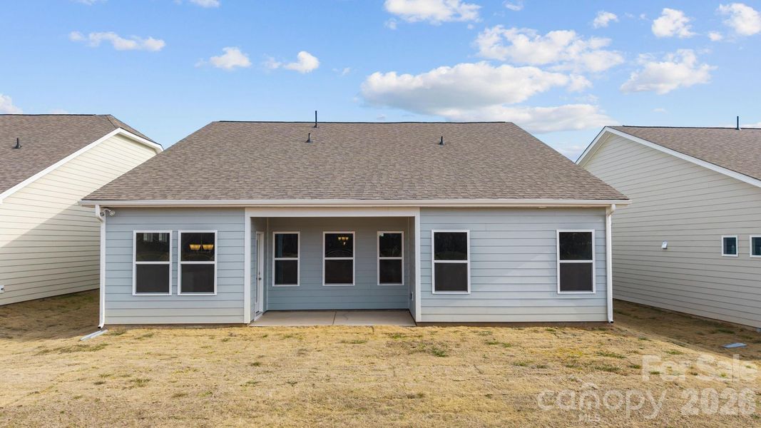 Exterior details and patio area of a home in Cottages at Wingate, Wingate (Image 17). Exterior details and patio area of a home in Cottages at Wingate, Wingate (Image 17).