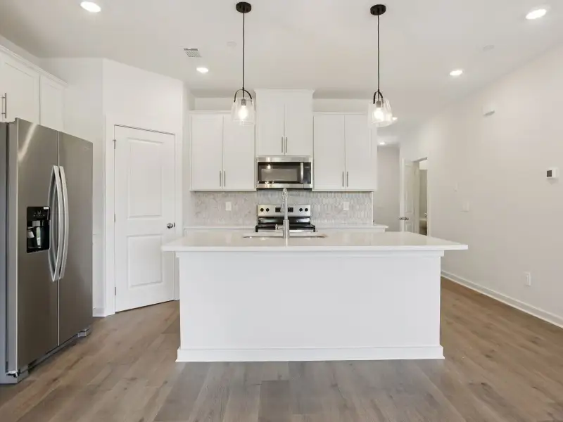 Furnished interior view inside a new home in Cedarcrest Townhomes, Fairview (Image 4).