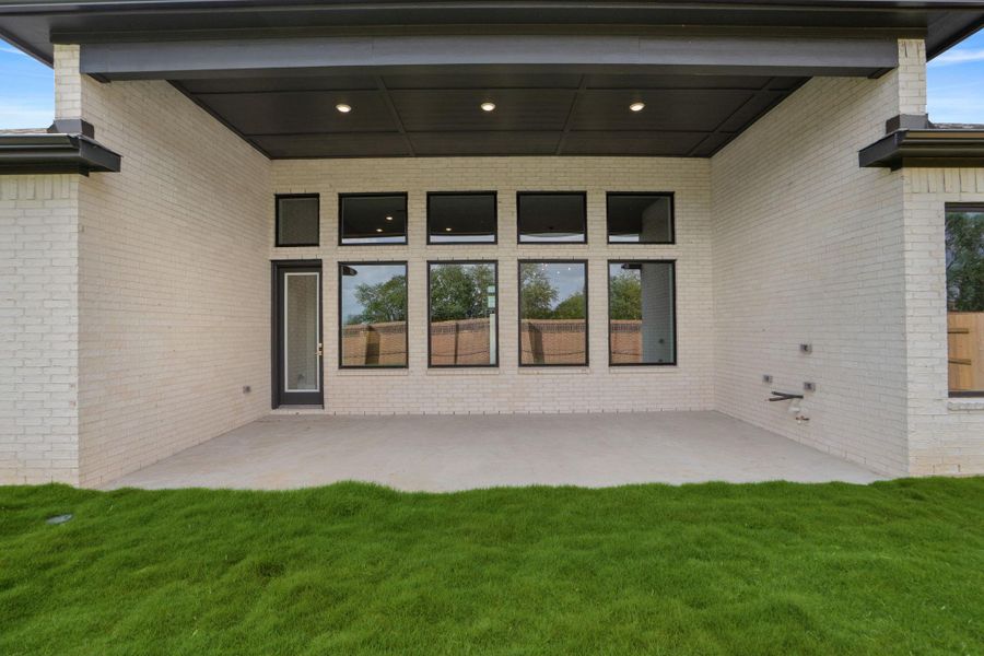 Expansive covered back patio perfect for entertaining Expansive covered back patio perfect for entertaining