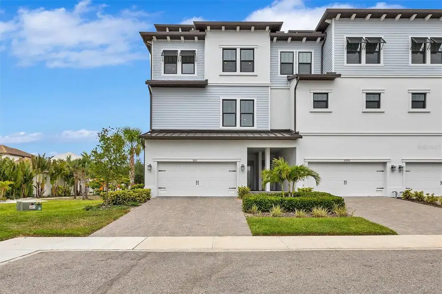 Front exterior of a new home in , Ruskin, FL, highlighting curb appeal (Image 1). Front exterior of a new home in , Ruskin, FL, highlighting curb appeal (Image 1).