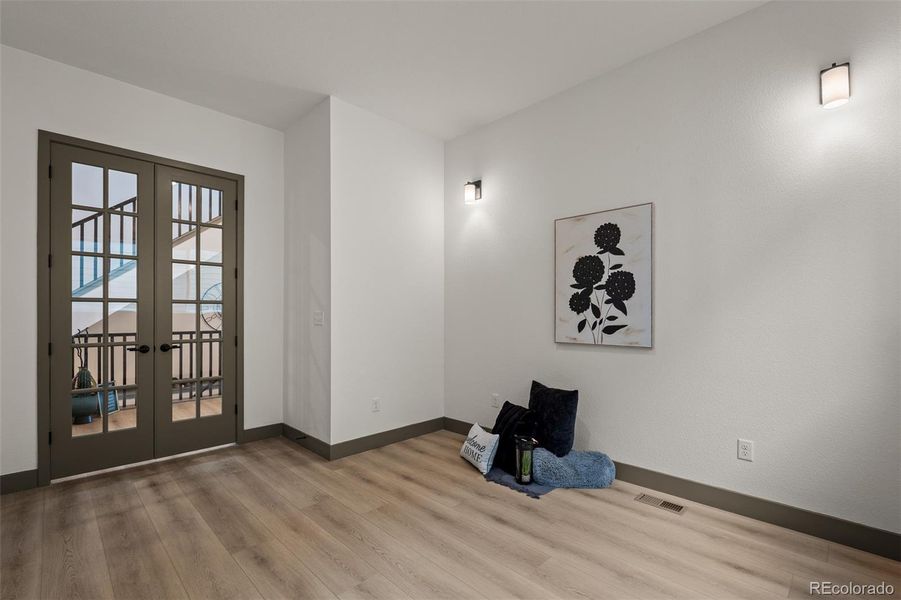 Spacious, unfurnished interior of a new home in Revel Crossing at Wolf Ranch - The Panorama Collection, Colorado Springs (Image 32).