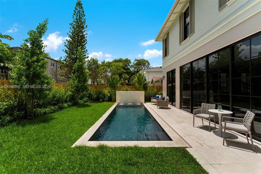 Exterior details and patio area of a home in , Miami (Image 3).