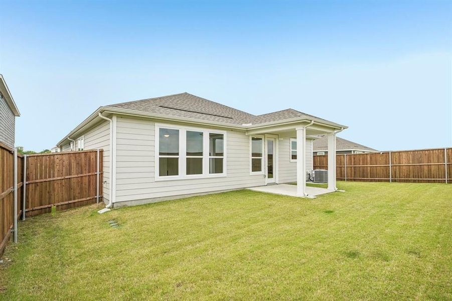 Exterior details and patio area of a home in Cottonwood Creek, Seagoville (Image 4).