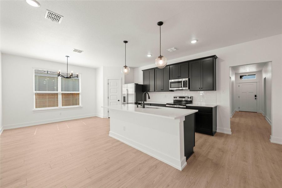 Furnished interior view inside a new home in Rancho San Gabriel, Georgetown (Image 6).