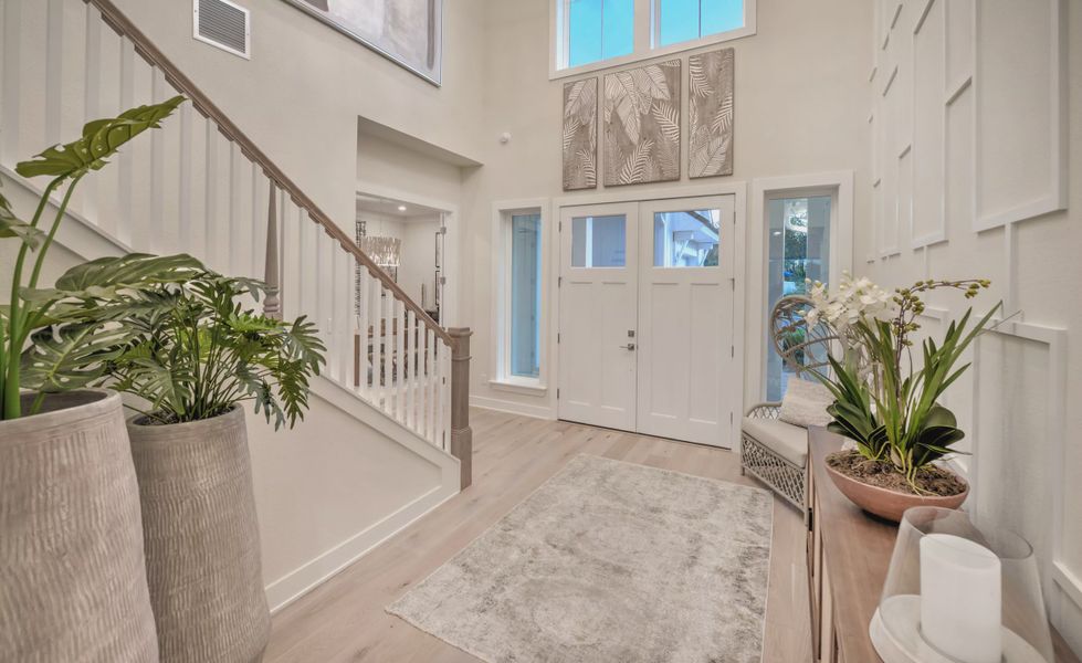 Front exterior of a new home in Middlebourne, St. Johns, FL, highlighting curb appeal (Image 2). Front exterior of a new home in Middlebourne, St. Johns, FL, highlighting curb appeal (Image 2).