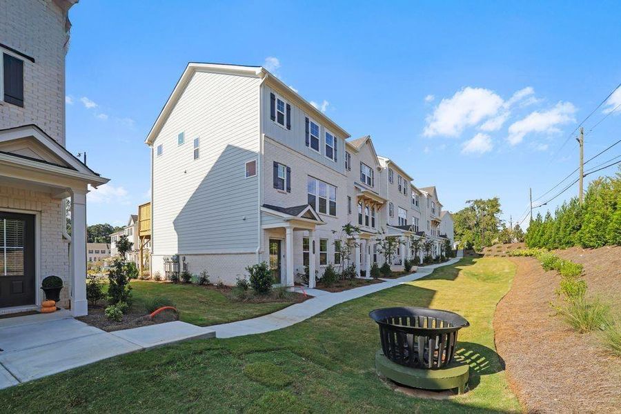 Front exterior of a new home in Somerset at Veterans Memorial, Mableton, GA, highlighting curb appeal (Image 25). Front exterior of a new home in Somerset at Veterans Memorial, Mableton, GA, highlighting curb appeal (Image 25).